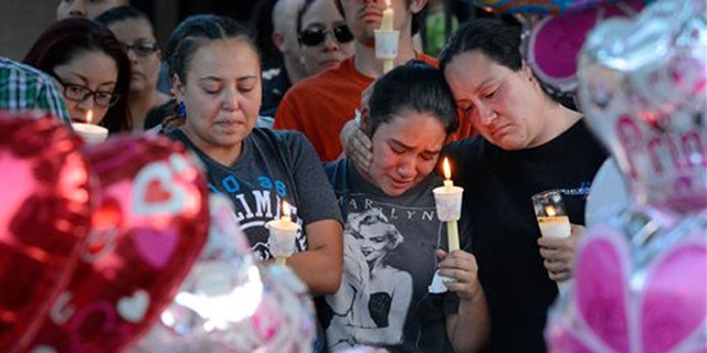 A candlelight vigil for 10-year-old Victoria Martens on Aug. 25, 2016, in Albuquerque, N.M.