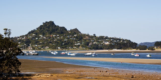 Some clever New Zealanders built an island off the beach at Tairua estuary in the Coromandel to avoid a citywide alcohol ban.
