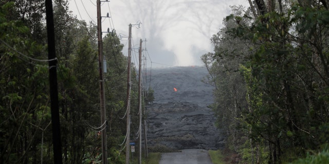 The Kilauea lava flow cuts off Kahukai Street, in the Leilani Estates near Pahoa, Hawaii, U.S., May 29, 2018.
