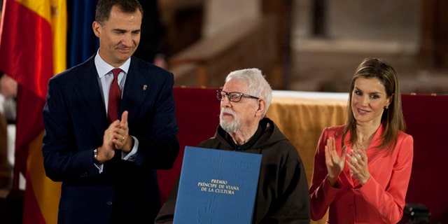 June 4, 2014: Historian Capuchino,Tarsicio de Azcona, center, receives the Prince's Viana Award, from Spain's Prince Felipe at the Monastery of Leyre, 40 miles from Pamplona, northern Spain. (AP)