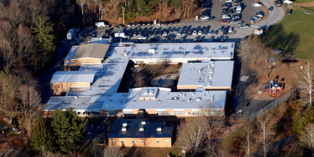Dec. 14, 2012: This photo shows Sandy Hook Elementary School in Newtown, Conn., where a gunman shot 27 people dead, including 20 children.