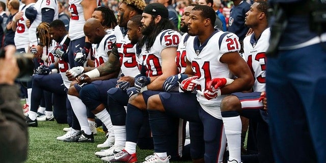 Several players from the Houston Texans seen kneeling during the national anthem in 2017.
