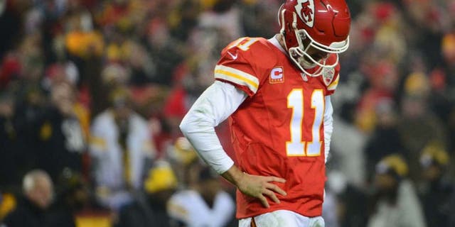 Jan 15, 2017; Kansas City, MO, USA; Kansas City Chiefs quarterback Alex Smith (11) reacts during the second quarter against the Pittsburgh Steelers in the AFC Divisional playoff game at Arrowhead Stadium. Mandatory Credit: Jeff Curry-USA TODAY Sports