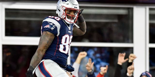 Patriots tight end Martellus Bennett celebrates after scoring a touchdown on Dec. 12.