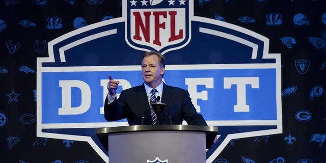 NFL Commissioner Roger Goodell opens up the 2016 NFL football draft at Selection Square in Grant Park, Thursday, April 28, 2016, in Chicago. (AP Photo/Matt Marton)