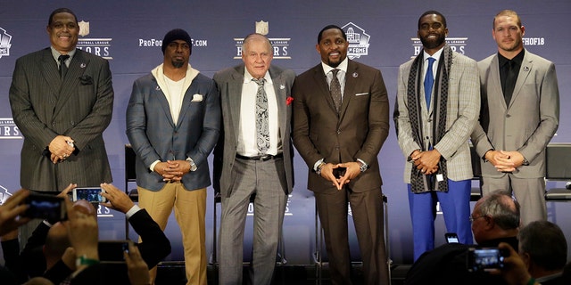 Former NFL players Robert Brazile, from left, Brian Dawkins, Bobby Beathard, Ray Lewis, Randy Moss, and Brian Urlacher who will be inducted into the Pro Football Hall of Fame class of 2018, attend the 7th Annual NFL Honors at the Cyrus Northrop Memorial Auditorium on Saturday, Feb. 3, 2018, in Minneapolis.