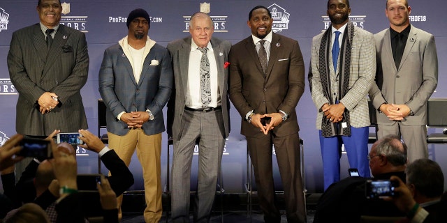 Former NFL players Robert Brazile, from left, Brian Dawkins, Bobby Beathard, Ray Lewis, Randy Moss, and Brian Urlacher who will be inducted into the Pro Football Hall of Fame class of 2018, attend the 7th Annual NFL Honors at the Cyrus Northrop Memorial Auditorium on Saturday, Feb. 3, 2018, in Minneapolis.