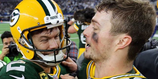 Jan 15, 2017; Arlington, TX, USA; Green Bay Packers kicker Mason Crosby (2) and Green Bay Packers outside linebacker Jordan Tripp (58) celebrate after beating the Dallas Cowboys in the NFC Divisional playoff game at AT&amp;T Stadium. Mandatory Credit: William Glasheen/The Post-Crescant via USA TODAY NETWORK