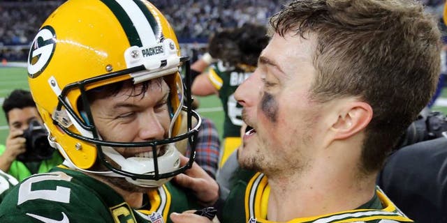 Jan 15, 2017; Arlington, TX, USA; Green Bay Packers kicker Mason Crosby (2) and Green Bay Packers outside linebacker Jordan Tripp (58) celebrate after beating the Dallas Cowboys in the NFC Divisional playoff game at AT&T Stadium. Mandatory Credit: William Glasheen/The Post-Crescant via USA TODAY NETWORK
