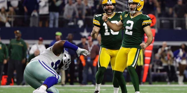 Jan 15, 2017; Arlington, TX, USA; Green Bay Packers kicker Mason Crosby (2) celebrates making a field goal in the NFC Divisional playoff game against the Dallas Cowboys at AT&T Stadium. Mandatory Credit: Kevin Jairaj-USA TODAY Sports