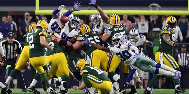Jan 15, 2017; Arlington, TX, USA; Green Bay Packers kicker Mason Crosby (2) kicks the game winning field goal during the fourth quarter against the Dallas Cowboys in the NFC Divisional playoff game at AT&T Stadium. Mandatory Credit: Kevin Jairaj-USA TODAY Sports