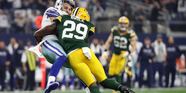 Jan 15, 2017; Arlington, TX, USA; Green Bay Packers defensive back Kentrell Brice (29) tackles Dallas Cowboys wide receiver Cole Beasley (11) during the second quarter in the NFC Divisional playoff game at AT&T Stadium. Mandatory Credit: Kevin Jairaj-USA TODAY Sports