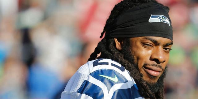 Nov 27, 2016; Tampa, FL, USA; Seattle Seahawks cornerback Richard Sherman (25) looks on prior to the game against the Tampa Bay Buccaneers at Raymond James Stadium. Mandatory Credit: Kim Klement-USA TODAY Sports