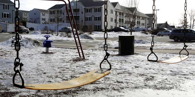 Jan. 22, 2015: An empty playground is seen at an apartment complex in Manchester, N.H.