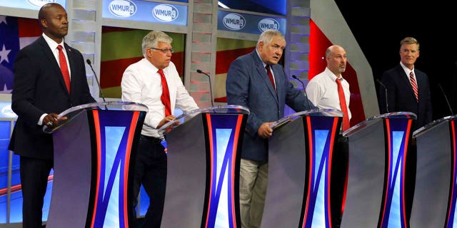 Republican hopefuls for New Hampshire's 1st Congressional District, from left to right, Eddie Edwards, Michael Callis, Andy Martin, Jeffory Denaro and Andy Sanborn participate in a debate at St. Anselm College in Manchester, N.H., Sept. 6.