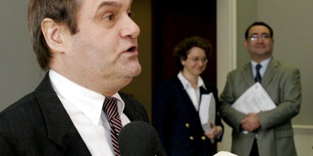 FILE: Rep. Steve Vaillancourt, left, criticizes the state's gay marriage panel as its chairman, Rep. Tony Soltani, R-Epsom, right, and its clerk Maureen Mooney, R-Merrimack, center, look on prior to a news conference in Concord, N.H.