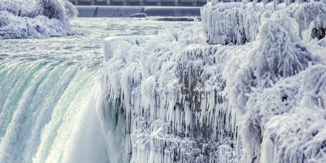 Niagara Falls was frozen solid by the Arctic temperatures blanketing much of the U.S.