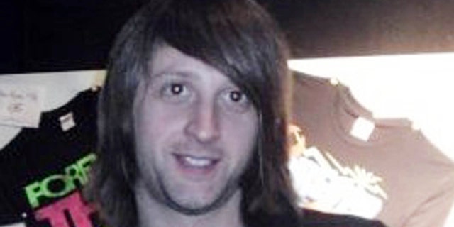 This undated family handout photo issued by the Foreign & Commonwealth Office on Saturday Nov. 14, 2015 shows Nick Alexander of England. Nick Alexander, one of the victims of the attacks in Paris, was working at the Bataclan concert hall selling merchandise for the performing band.