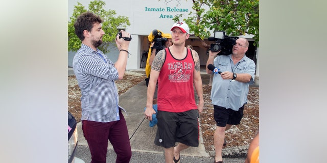 Singer Nick Carter is surrounded by media  after being released on $1,500 bond from the Monroe County Detention Center in Key West, Fla., Jan. 14, 2016. Carter was charged with misdemeanor battery.(Rob O' Neal/Key West Citizen via AP)MIAMI HERALD OUT