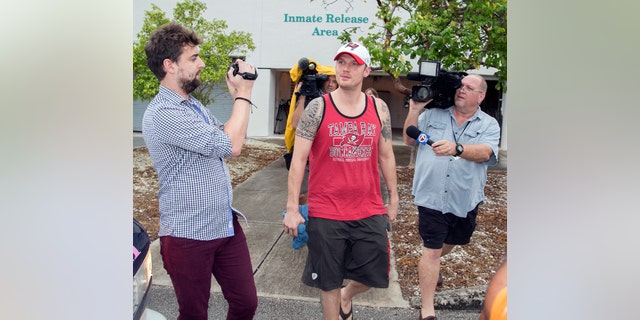 Singer Nick Carter is surrounded by media after being released on $1,500 bond from the Monroe County Detention Center in Key West, Fla., Jan. 14, 2016. Carter was charged with misdemeanor battery.(Rob O' Neal/Key West Citizen via AP)MIAMI HERALD OUT