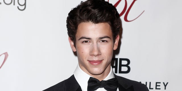 Singer Nick Jonas arrives for the 28th Annual Drama League Musical Celebration of Broadway in New York February 6, 2012. REUTERS/Carlo Allegri (UNITED STATES - Tags: ENTERTAINMENT HEADSHOT) - RTR2XFK4