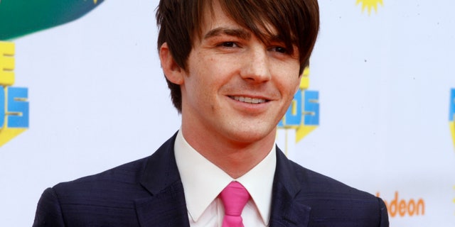 Actor Drake Bell poses at the 2011 Nickelodeon Kids Choice Awards