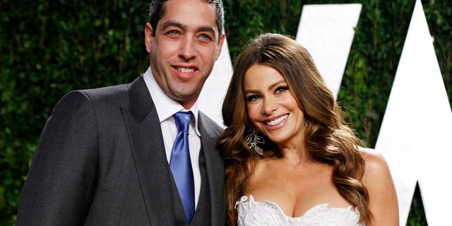 Actress Sofia Vergara and Nick Loeb arrive at the 2012 Vanity Fair Oscar party in West Hollywood, California February 26, 2012.