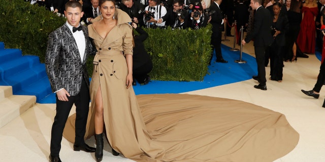 Nick Jonas and Priyanka Chopra who are rumored to be dating, were spotted walking together in JFK airport Friday, June 8. Here, the pair pose at the 2017 Met Gala.