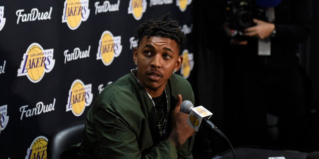 Mar 30, 2016; Los Angeles, CA, USA; Los Angeles Lakers forward Nick Young (0) at press conference related to guard D'Angelo Russell (1) at Staples Center. Mandatory Credit: Richard Mackson-USA TODAY Sports - RTSCX9U