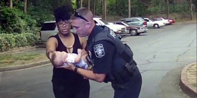 "It was a joyous experience, I'll tell you that," Marietta Police Officer Nick St. Onge said after using CPR to revive a choking infant.