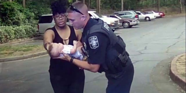 "It was a joyous experience, I'll tell you that," Marietta Police Officer Nick St. Onge said after using CPR to revive a choking infant.
