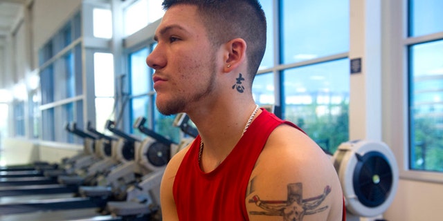 Team USA boxer, Nico Hernandez, rests after finishing his workout at the Ted Stevens Sports Services Center, part of the US Olympic Training Center in Colorado Springs, Colorado, May 25, 2016.US athletes were training in preparation for the upcoming Olympics in Rio de Janeiro, Brazil. / AFP / Jason Connolly (Photo credit should read JASON CONNOLLY/AFP/Getty Images)