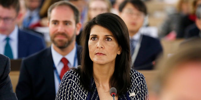 United States permanent Representative to the United Nations Ambassador Nikki Haley waits before delivering a speech about the current humanitarian situation in the world, during the opening of the 35th session of the Human Rights Council, at the European headquarters of the United Nations in Geneva, Switzerland, Tuesday, June 6, 2017. (Magali Girardin/Keystone via AP)