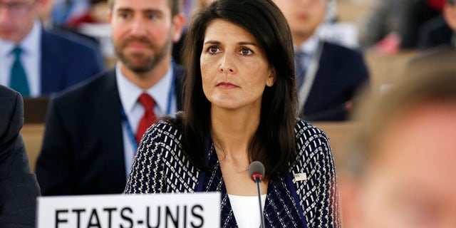 United States permanent Representative to the United Nations Ambassador Nikki Haley waits before delivering a speech about the current humanitarian situation in the world, during the opening of the 35th session of the Human Rights Council, at the European headquarters of the United Nations in Geneva, Switzerland, Tuesday, June 6, 2017. (Magali Girardin/Keystone via AP)