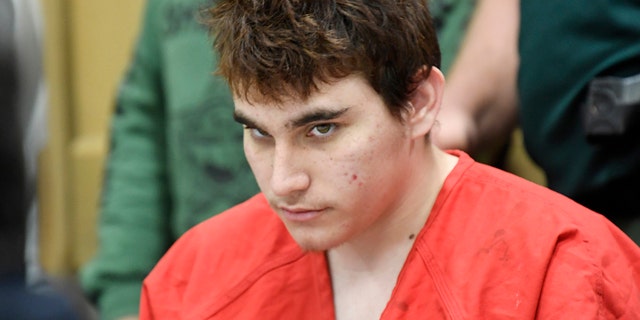 Florida school shooting suspect Nikolas Cruz, looks up while in court for a hearing in Fort Lauderdale, Fla., Friday, April 27, 2018.