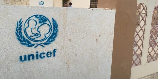 In the Christian town of Teleskof, the U.N. brandishes its name outside a girls’ school as a sign that it is reconstructing within. But photos of the interior reveal abandoned, unlit classrooms strewn with rubble and possibly booby traps.