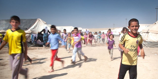Many of the Yazidi and Assyrian familes have been at refugee camps near the Iraq-Turkish border.