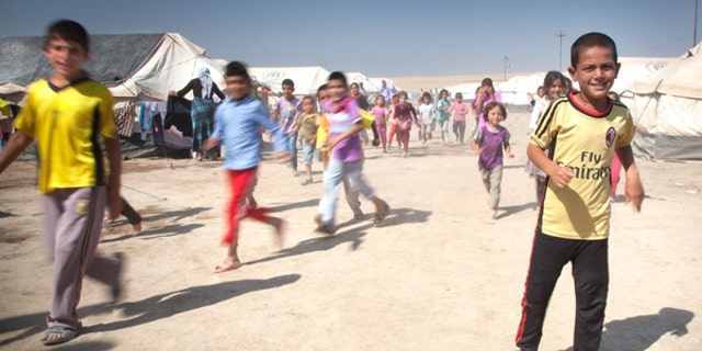 Many of the Yazidi and Assyrian familes have been at refugee camps near the Iraq-Turkish border.