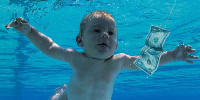 The man who was photographed as a baby on the cover of Nirvana's â€˜Nevermindâ€™ album is now accusing the band of child pornography.