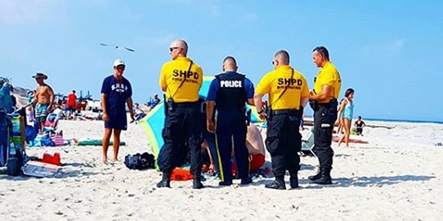 A beachgoer said there was a strong gust of wind at the time of the incident.