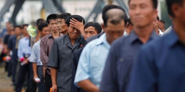Local residents at the port area of the North Korean Special Economic Zone of Rason City, near the China-Russia border.