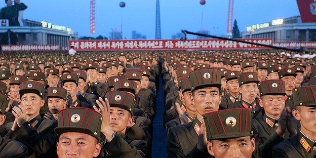 Soldiers gather in Kim Il Sung Square in Pyongyang, North Korea,Thursday, July 6, 2017, to celebrate the test launch of North Korea's first intercontinental ballistic missile two days earlier. The North's ICBM launch, its most successful missile test to date, has stoked security worries in Washington, Seoul and Tokyo as it showed the country could eventually perfect a reliable nuclear missile capable of reaching anywhere in the United States. Analysts say the missile tested Tuesday could reach Alaska if launched at a normal trajectory. (AP Photo/Jon Chol Jin)