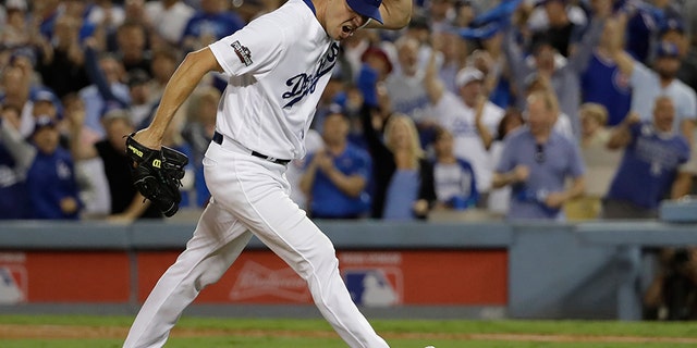 Oct. 18, 2016: Los Angeles Dodgers starting pitcher Rich Hill reacts after striking out Chicago Cubs' Anthony Rizzo during the sixth inning of Game 3 of the National League baseball championship series in Los Angeles