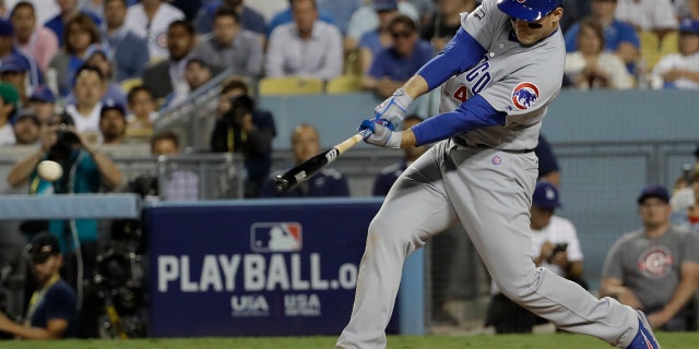 Oct. 19, 2016: Chicago Cubs' Anthony Rizzo hits a two-run scoring single during the sixth inning of Game 4 of the National League baseball championship series against the Los Angeles Dodgers in Los Angeles