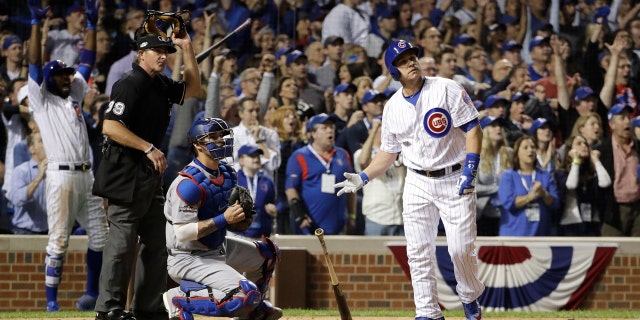 Oct. 15, 2016: Chicago Cubs catcher Miguel Montero (47) watches the ball as he hits a grand slam during the eighth inning of Game 1 of the National League baseball championship series against the Los Angeles Dodgers in Chicago