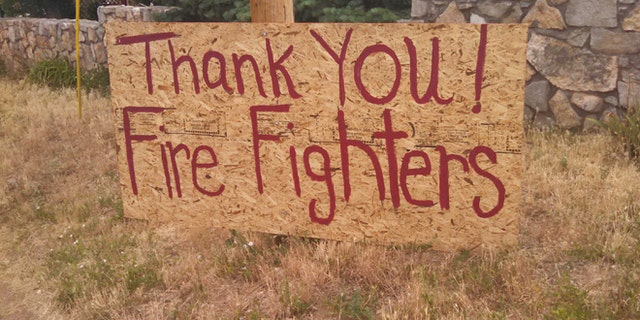 Residents are grateful to firefighters, but angry at the federal government.