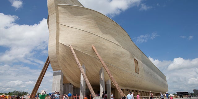 July 5, 2016: Visitors pass outside the front of a replica Noah's Ark at the Ark Encounter theme park during a media preview day in Williamstown, Ky.