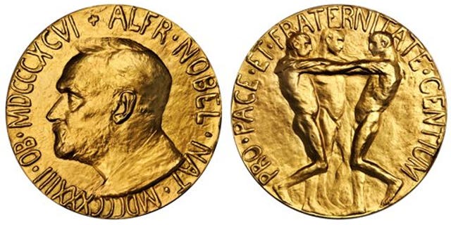 This undated photo provided by Stacks Bowers Galleries shows both sides of a Nobel Peace Prize that was saved from possible destruction for the value of its gold. The 1936 medal is only the second Nobel Peace Prize to come to auction and marked the first time an individual from Latin America was recognized by the prestigious award. The 23-karat relic is being offered for sale in Baltimore on March 27, 2014, by the New York-based Stacks Bowers Galleries. (AP Photo/Stacks Bowers Galleries)