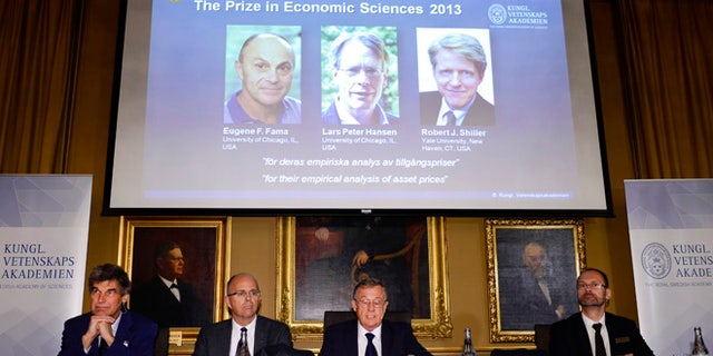 Oct. 14, 2013: The Royal Swedish Academy of Sciences Torsten Persson, from left, Per Krusell, Staffan Normark and Per Stromberg announce the winners of 2013 Nobel Memorial Prize in Economic Sciences as Eugene Fama, Lars Peter Hansen and Robert Shiller during a press conference at the Royal Swedish Academy of Sciences in Stockholm.