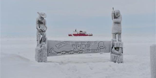 Jan. 14, 2012: This image provided by the U.S. Coast Guard shows the Coast Guard Ice Breaker Healy breaking ice near the city of Nome Alaska.